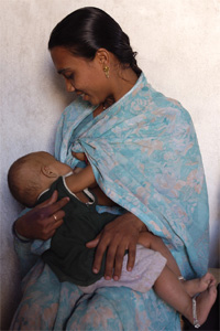 Mother breastfeeding infant